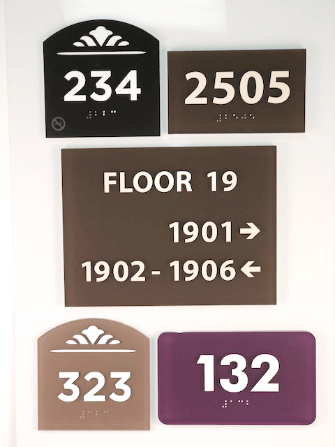 Colored acrylic signage examples created by APS.