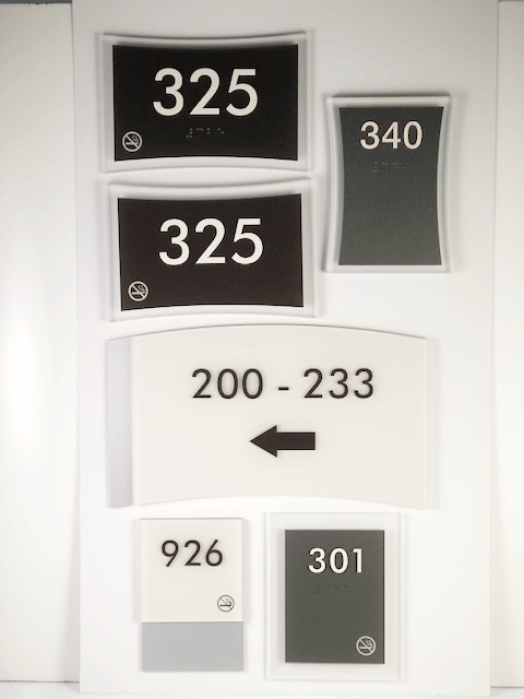 An assortment of layered-type signage available from APS.